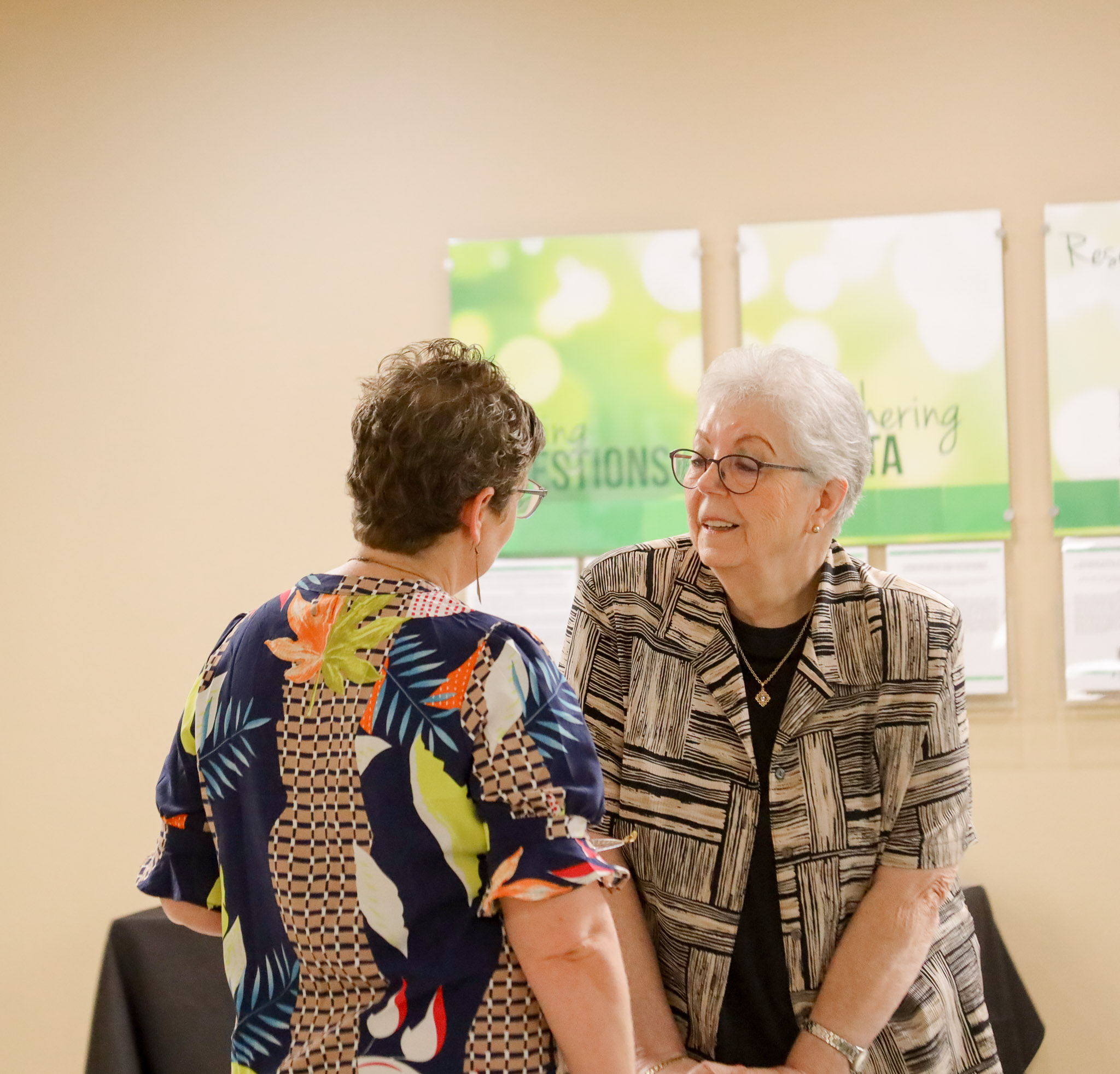 Garland Graduation Reception Social Work Faculty Talking