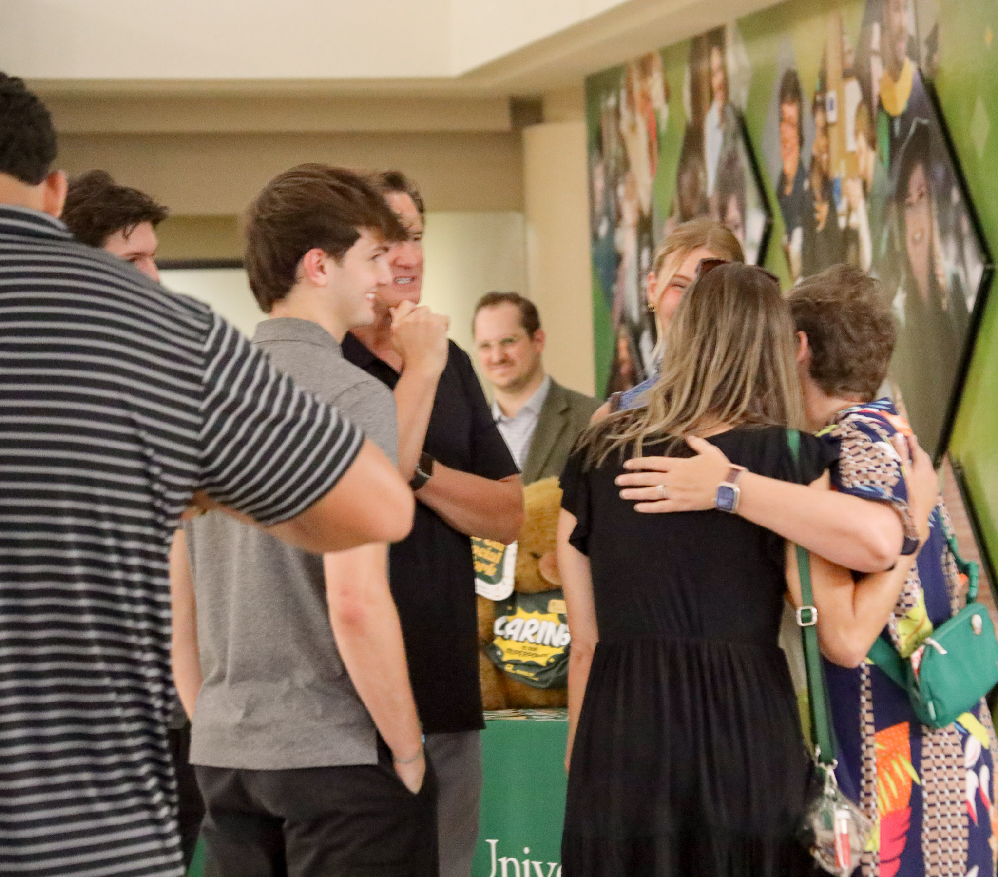MSW Graduation Reception Guest Hugging