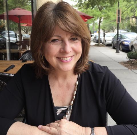 Kay O'Brien, former social work recruiter smiles for the camera