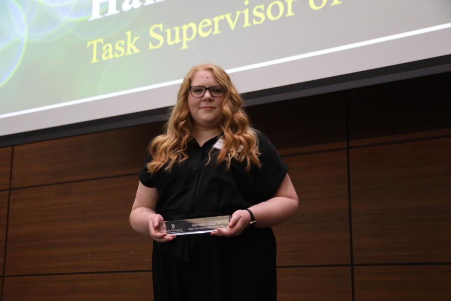 Hannah Osborne poses with her social work award