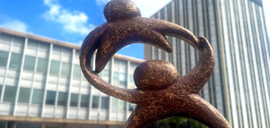 Legacy logo award in front of our building